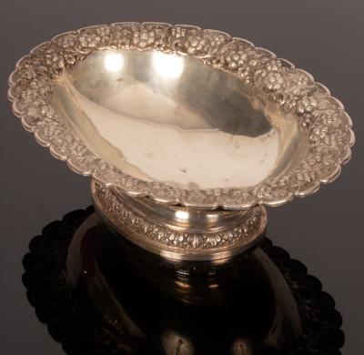 Appraisal: An Indian white metal oval fruit bowl with chased border