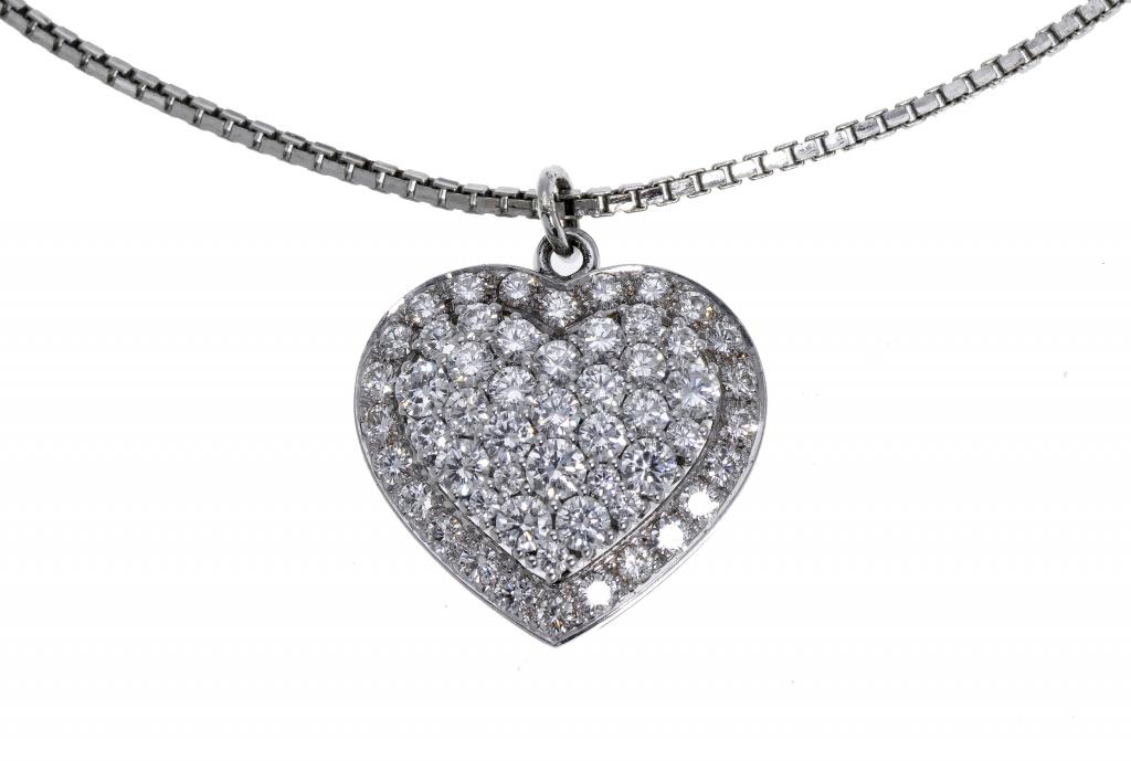 Appraisal: A DIAMOND HEART SHAPED PENDANT pav set on white gold