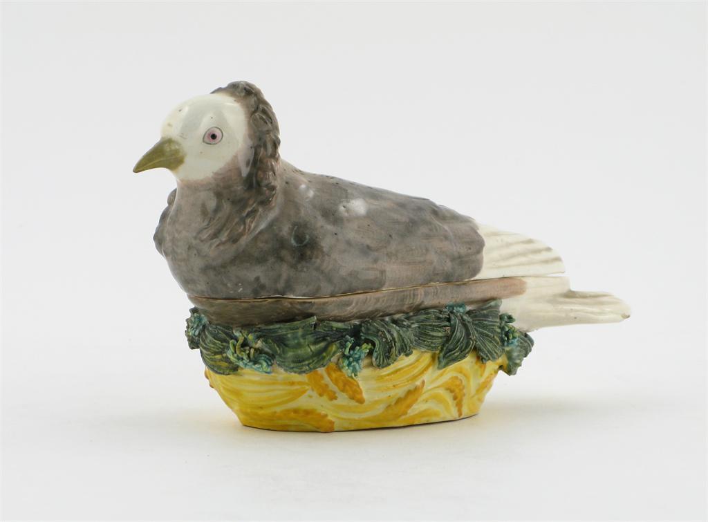 Appraisal: A Staffordshire porcelain dove box and cover