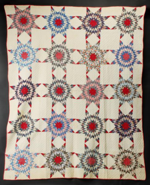 Appraisal: AN ANTIQUE 'HARVEST SUN' PATTERN QUILTTwenty fancy eight-point blocks calico