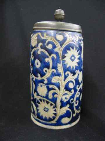 Appraisal: Early Pottery Stein carved floral bird decor blue decoration ''