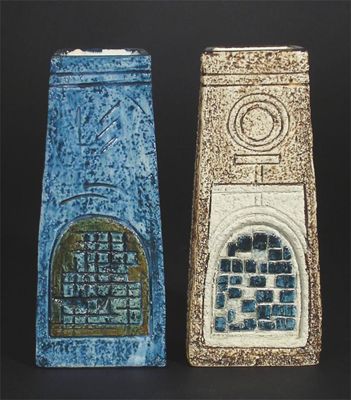 Appraisal: Two Troika Pottery Coffin vases each modelled in low relief