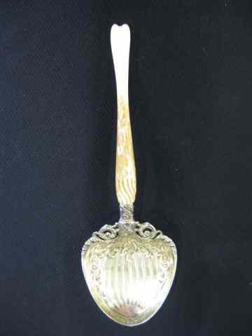 Appraisal: Whiting Sterling Ivory Berry Spoon elaborate bowl with gold wash