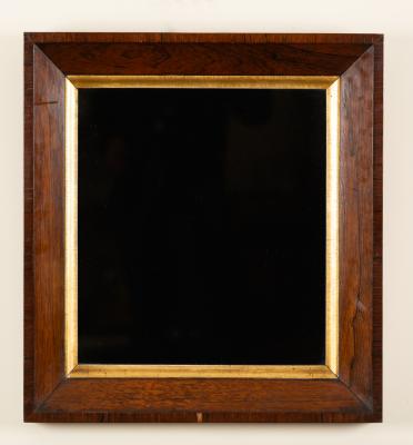 Appraisal: An early th Century rosewood wall mirror with gilt surround