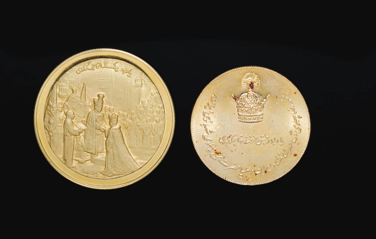 Appraisal: TWO SIMILAR IRANIAN GOLD MEDALS COMMEMORATING THE CORONATION OF THE