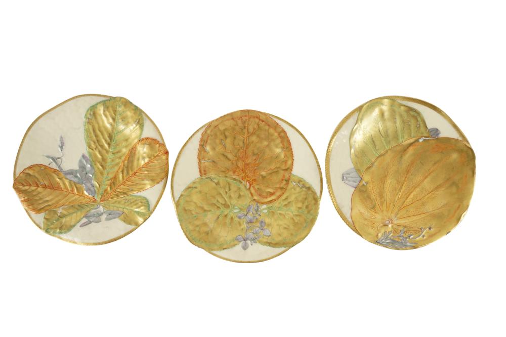 Appraisal: THREE GILT PORCELAIN PLATESunmarked decorated with foliage each inches diameter