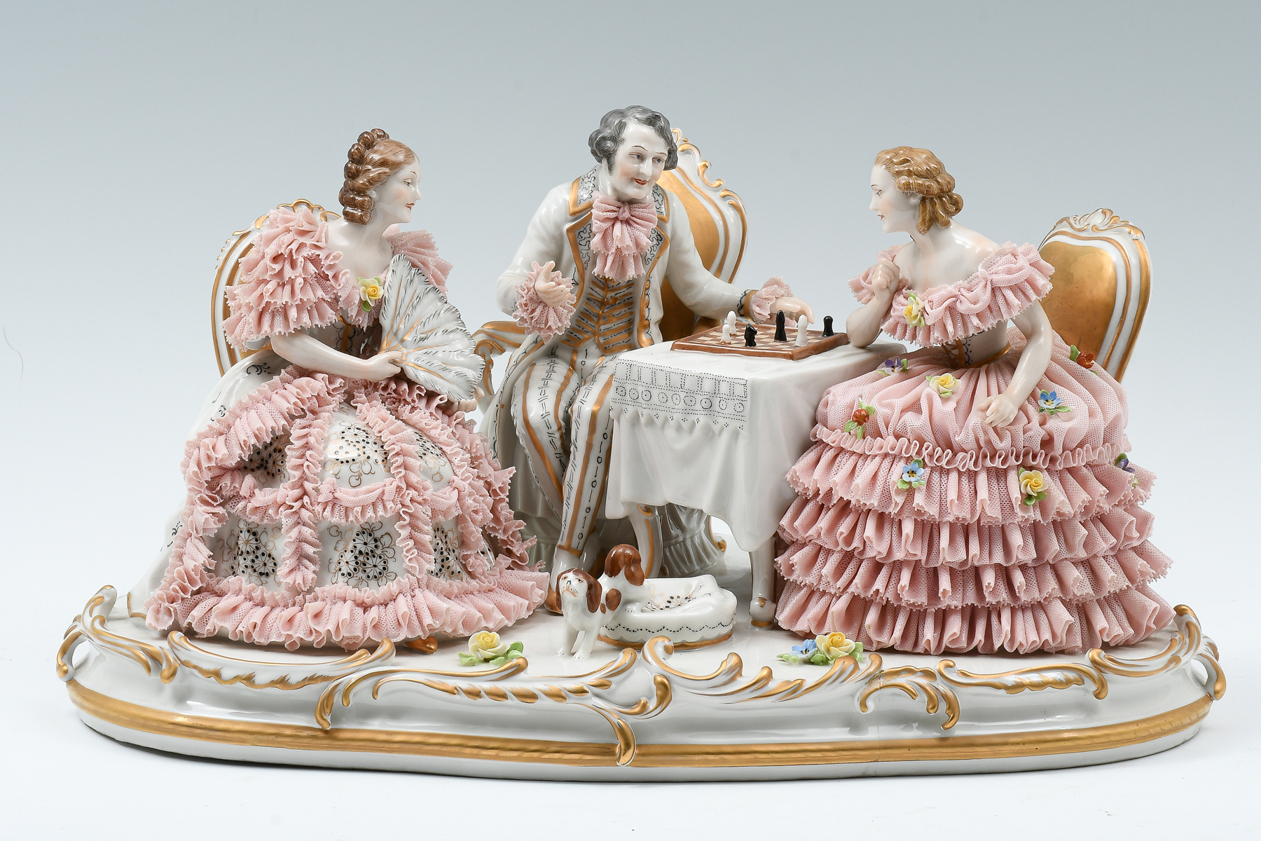 Appraisal: DRESDEN PORCELAIN CHESS GAME SCULPTURE Having three figures engaged in