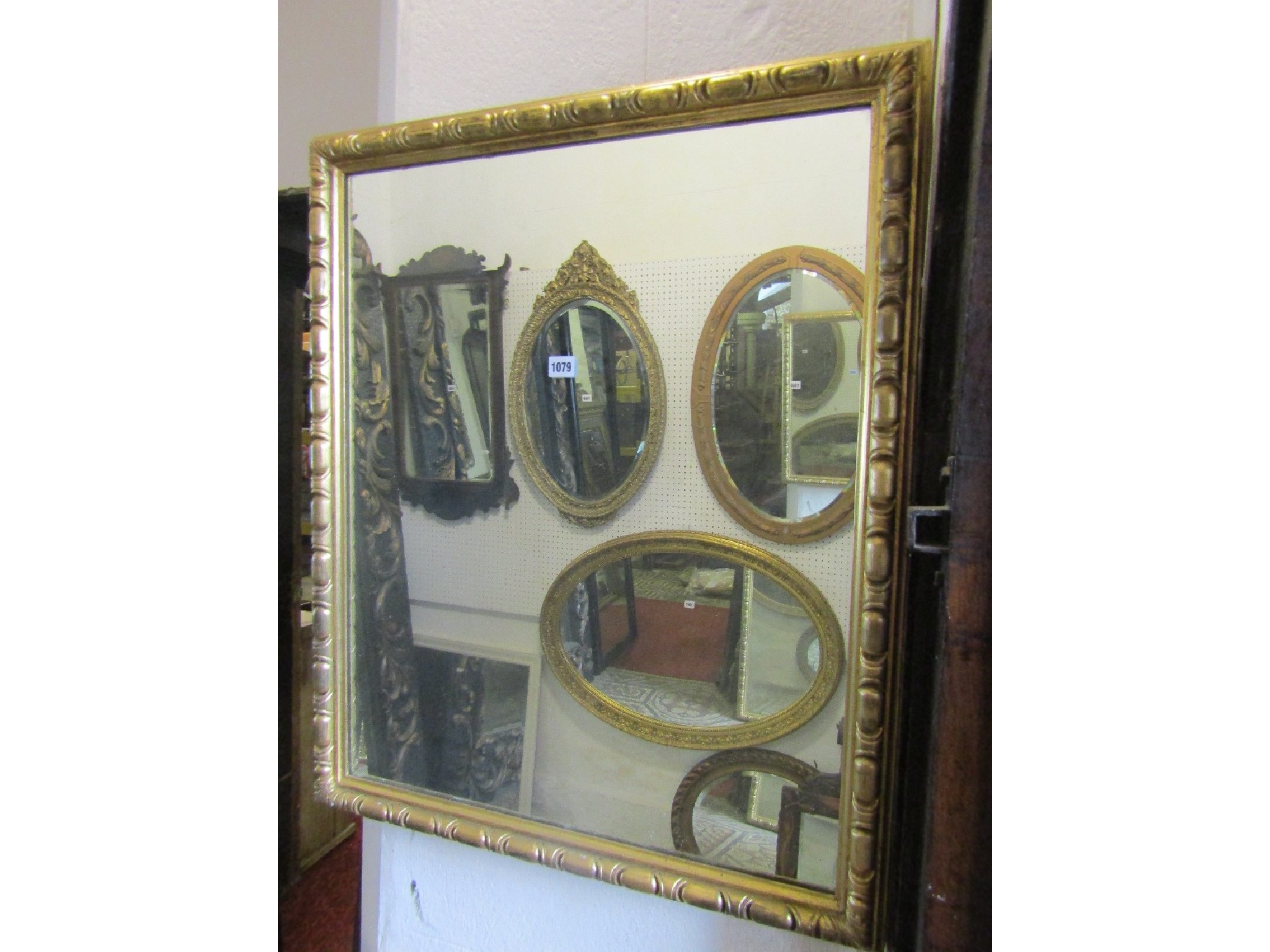 Appraisal: A pair of wall mirrors of rectangular form with gilt