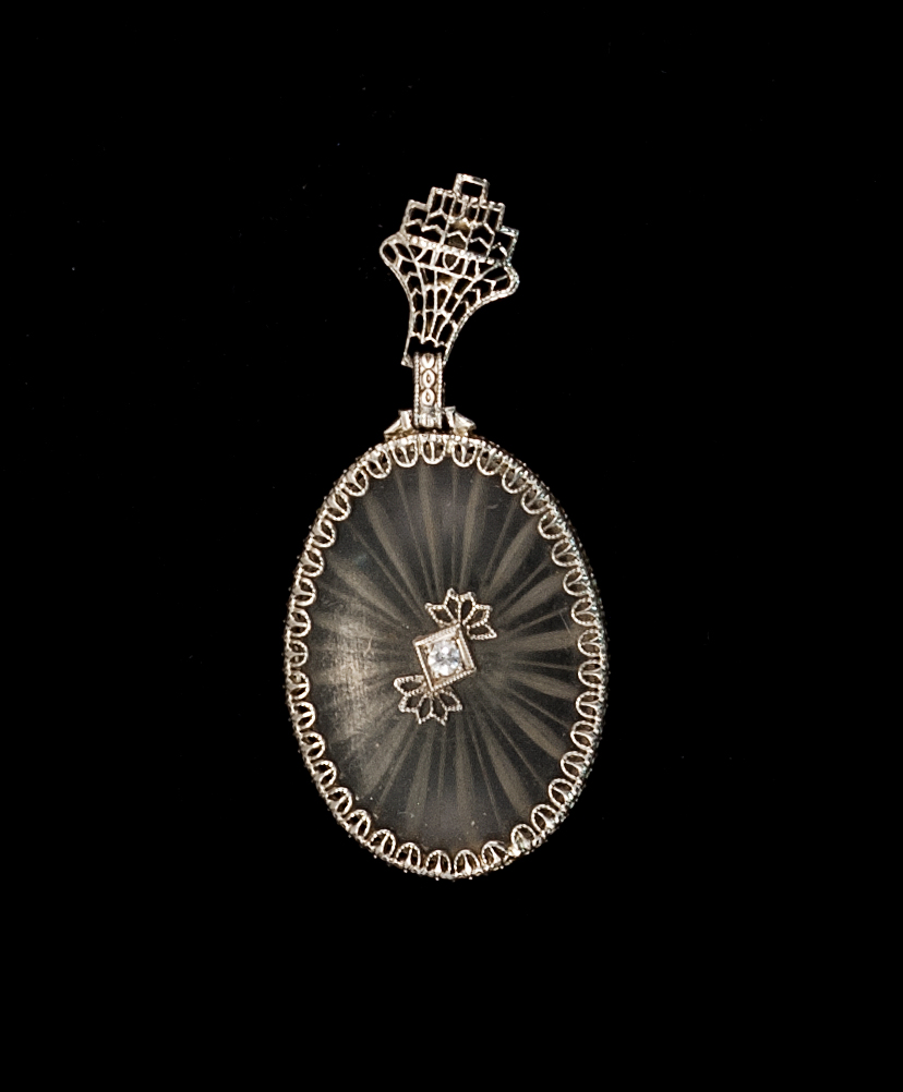 Appraisal: ROCK CRYSTAL AND DIAMOND PENDANT Circa kt white gold mount