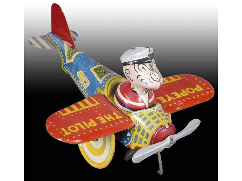 Appraisal: Marx Tin Wind-Up Popeye Aeroplane Toy Description '' Wingspan -