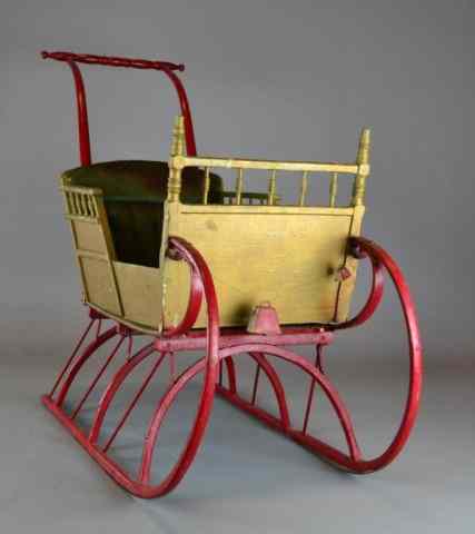 Appraisal: A VICTORIAN BENTWOOD IRON MOUNTED SLEIGHA child's sleigh in bentwood