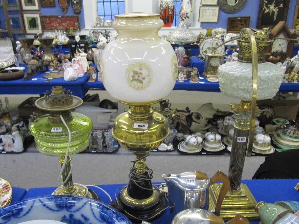 Appraisal: Three various paraffin lamps two without shades