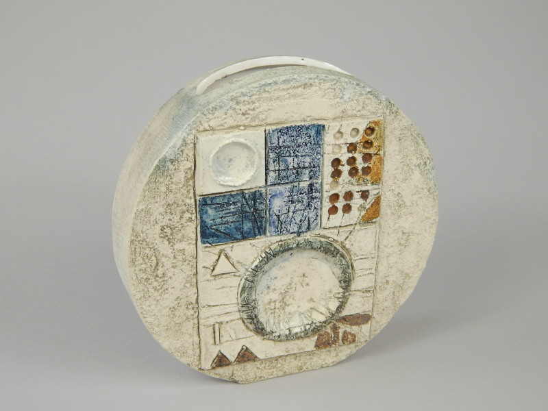 Appraisal: A Troika wheel shaped Studio pottery case with geometric and