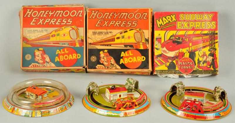 Appraisal: Lot of Tin Litho Marx Honeymoon Express Toys Description American