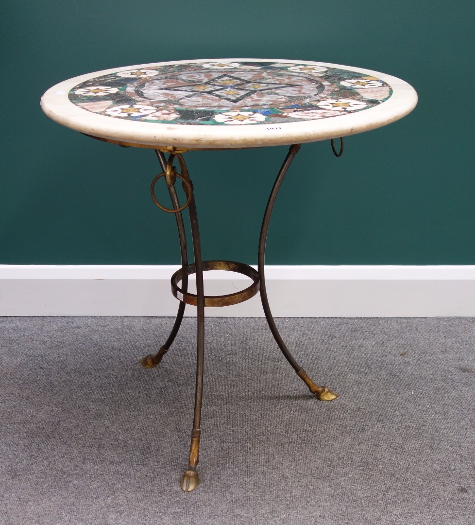 Appraisal: A th century circular specimen marble table top on a