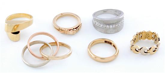 Appraisal: Gold bands three are K yellow gold one K white