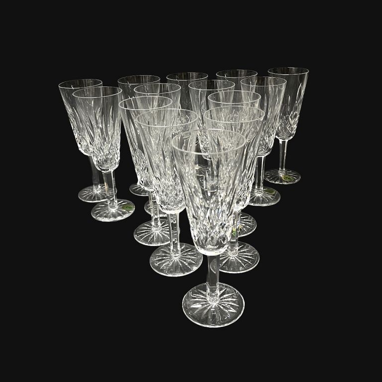 Appraisal: Fourteen Waterford Champagne Glasses Fourteen Waterford Champagne Glasses Signed Measures