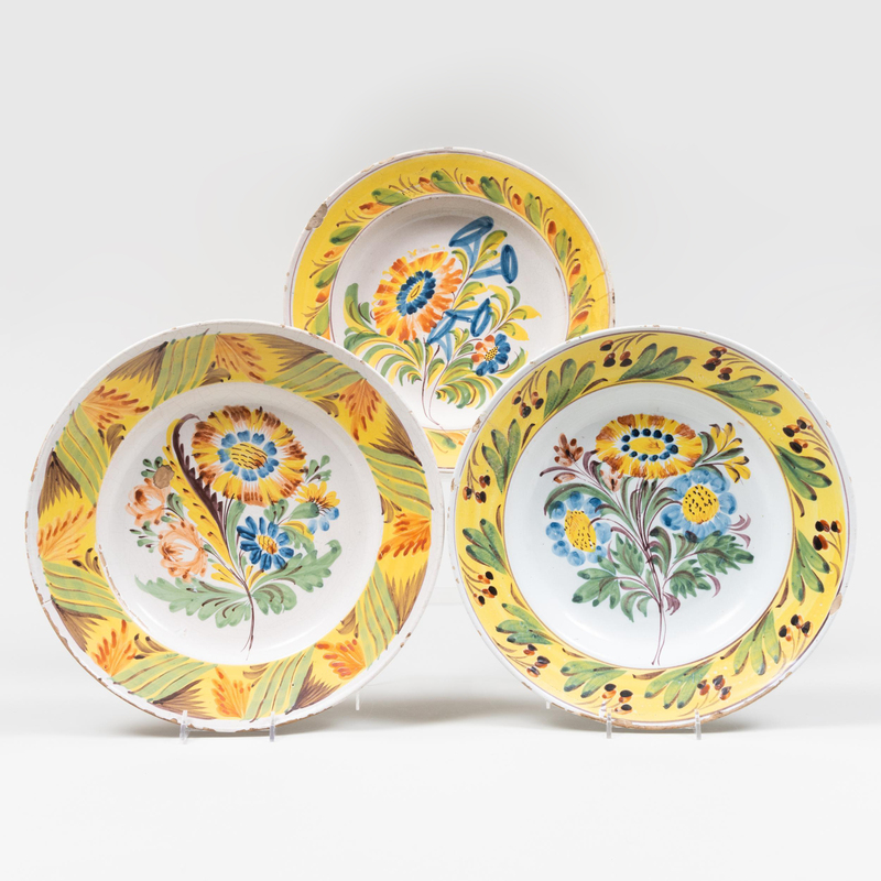 Appraisal: Group of Three German Polychrome Delft Dishes Unmarked The largest