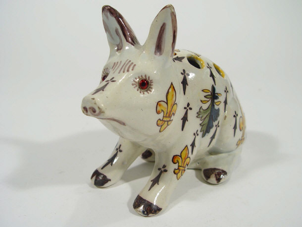 Appraisal: Faience glazed pig flower brick hand painted with an armorial