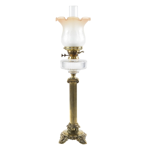 Appraisal: A Victorian brass doric column oil lamp with palmette cast