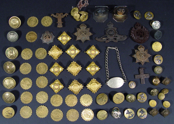 Appraisal: Collection of military cap badges buttons and pips and also