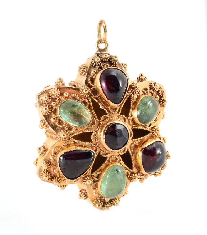 Appraisal: K EMERALD GARNET ETRUSCAN REVIVAL PENDANT Puffed star form decorated