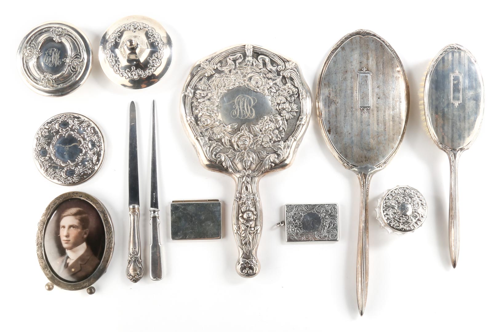 Appraisal: Miscellaneous American sterling silver items comprising three hand mirrors three