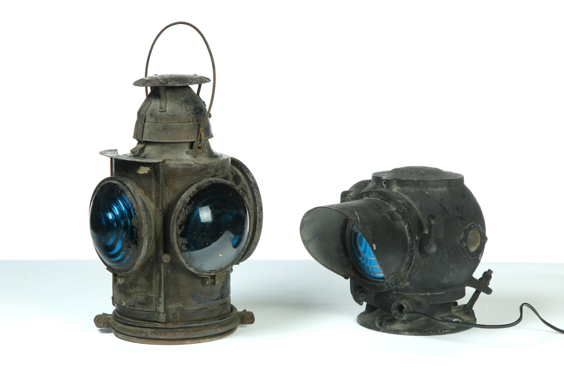 Appraisal: TWO HANDLAN SWITCH LANTERNS American nd quarter- th century Cast