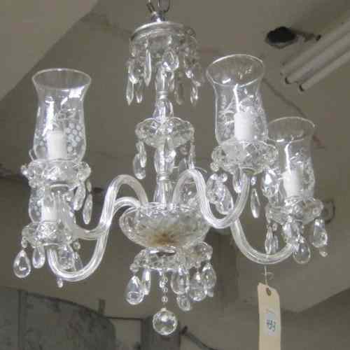 Appraisal: FIVE-LIGHT CRYSTAL CHANDELIER each candlelight fitted with a clear glass