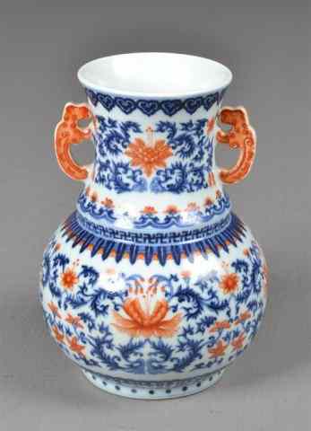 Appraisal: Chinese Blue White Red Porcelain VaseWhite porcelain bulbous vase with