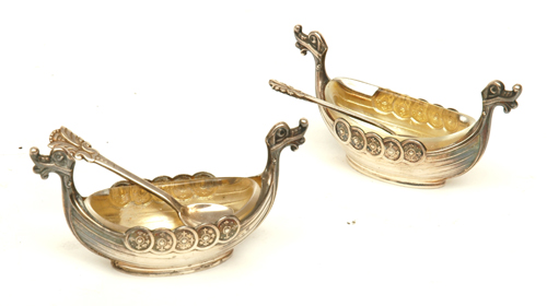 Appraisal: A PAIR OF NORWEGIAN STERLING SILVER SALT CELLARS AND SPOONS