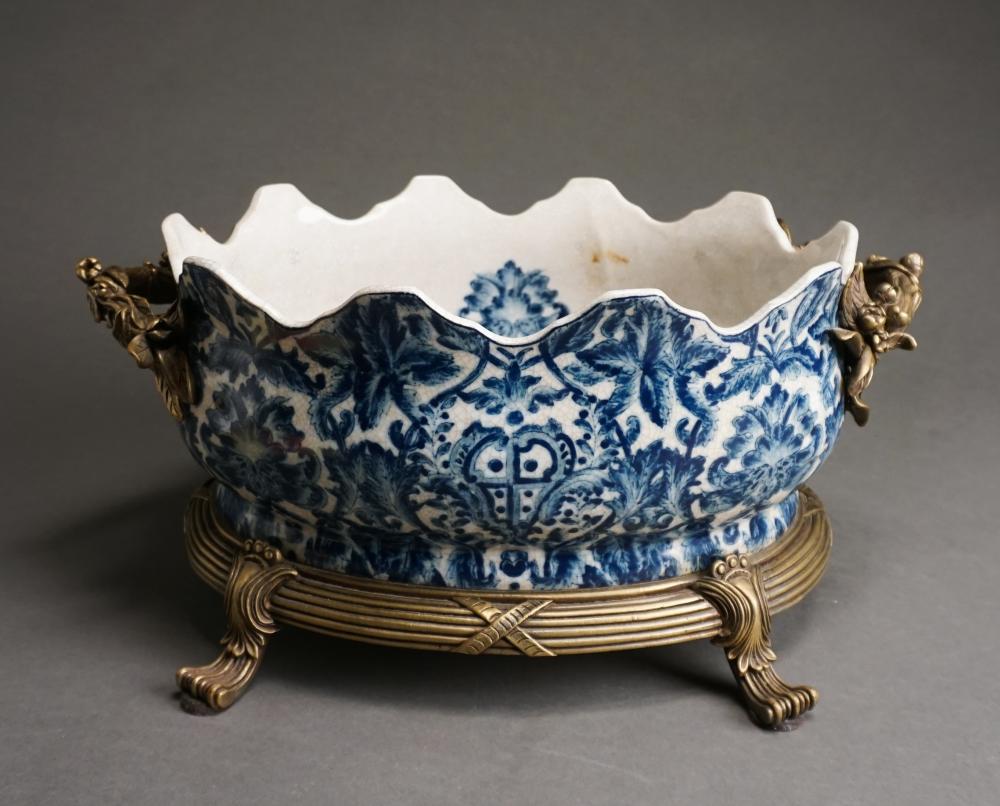 Appraisal: ASIAN BRASS MOUNTED BLUE AND WHITE PORCELAIN MONTEITH H IN