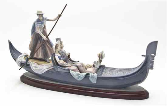 Appraisal: A Lladro Porcelain Figural Group In the Gondola issued in