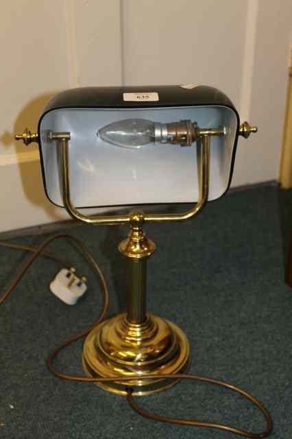 Appraisal: A BRASS STUDENT'S LAMP with Corinthian column platform base and