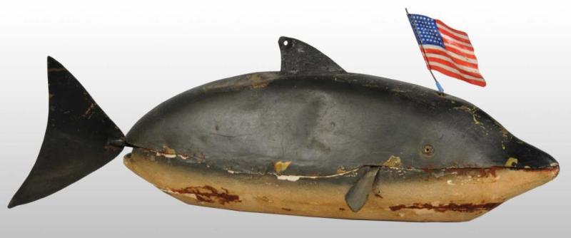 Appraisal: Early French Tin Dolphin Toy Description Tin body fins and