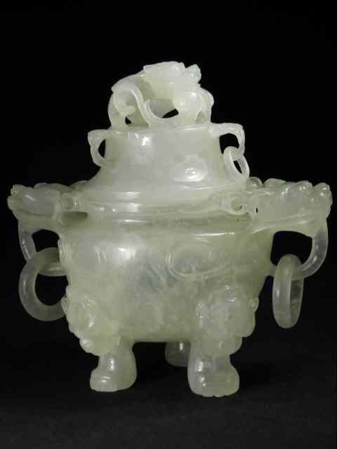 Appraisal: A Chinese carved hardstone covered urn with suspended loose ring