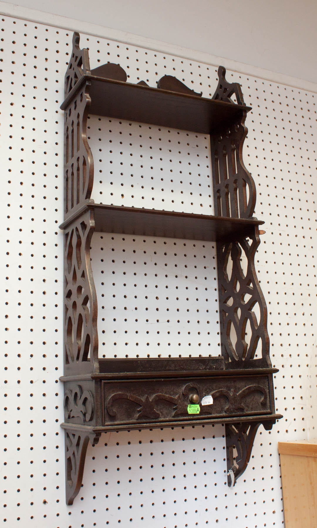 Appraisal: a Carved wood wall shelf