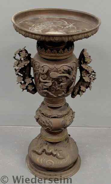 Appraisal: Asian bronze pedestal decorated with animals and cherry blossoms h