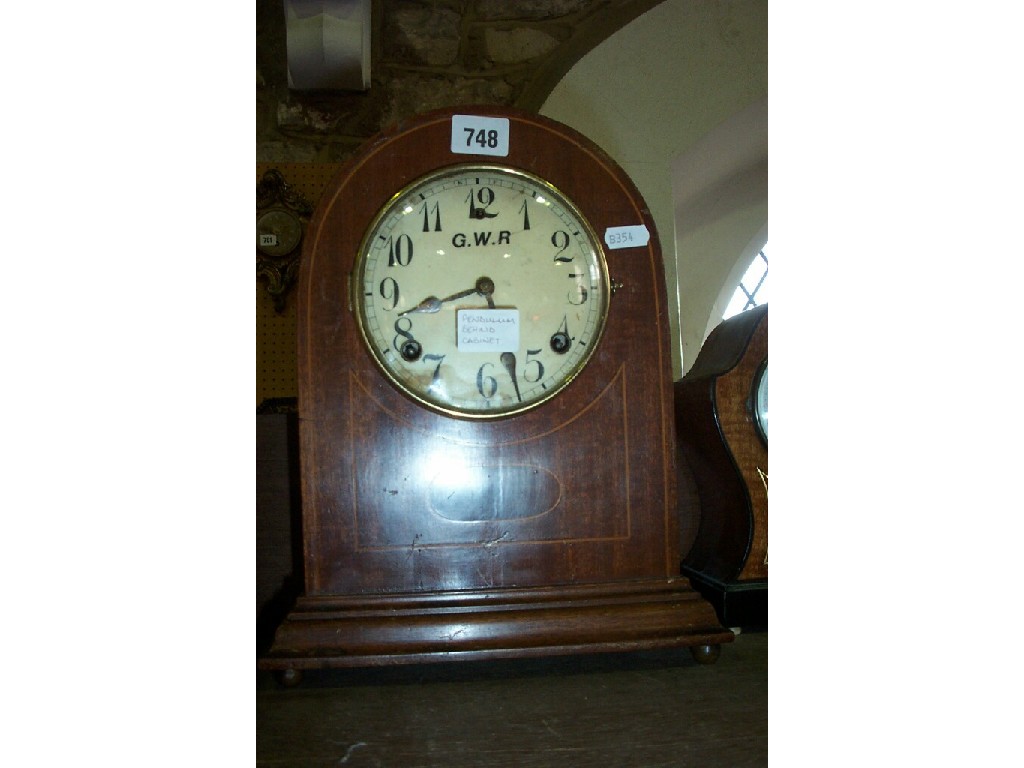 Appraisal: An Edwardian mahogany mantle clock with inlaid string detail and