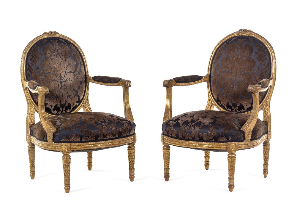 Appraisal: A Pair of Louis XVI Giltwood Fauteuils A Pair of