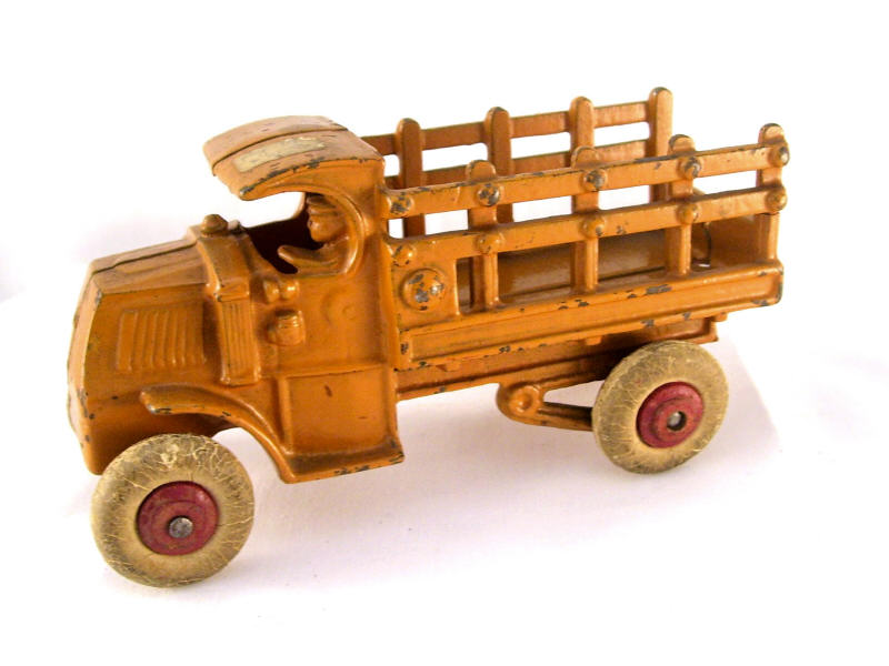 Appraisal: Cast Iron Farm Produce Truck Original orange paint white rubber