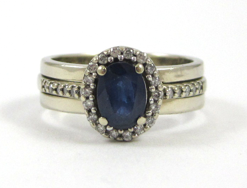 Appraisal: SAPPHIRE DIAMOND AND FOURTEEN KARAT GOLD RING The white gold