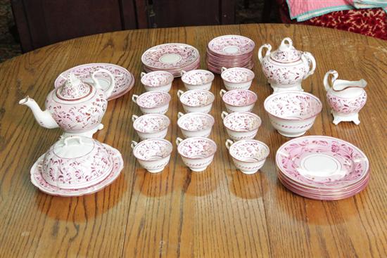 Appraisal: PINK AND COPPER LUSTREWARE TEA SET Forty-six piece set including