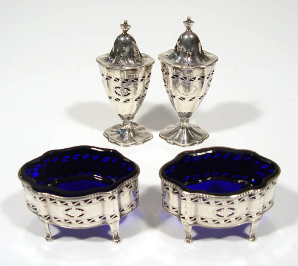 Appraisal: Silver four piece cruet set comprising a pair of shaped