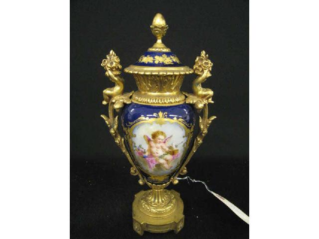 Appraisal: Sevres French Porcelain Bronze Urn cherub bird decor putti on