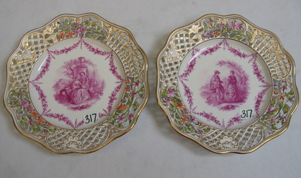 Appraisal: PAIR OF DRESDEN PORCELAIN PLATES magenta colored courting scenes with