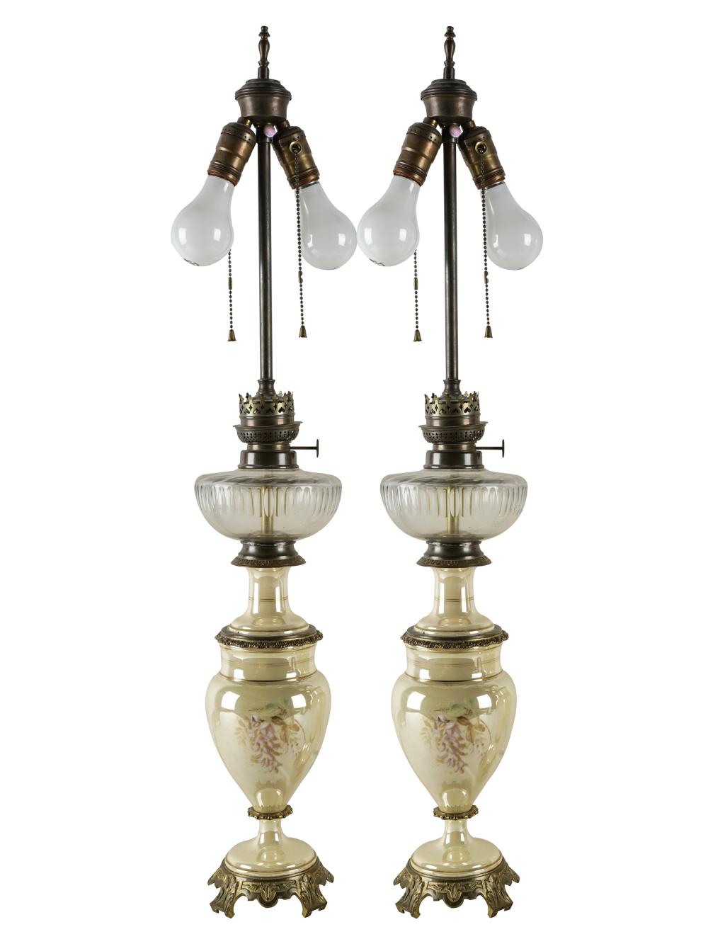 Appraisal: PAIR OF LUSTER PORCELAIN ELECTRIFIED OIL LAMPSCondition each with chips