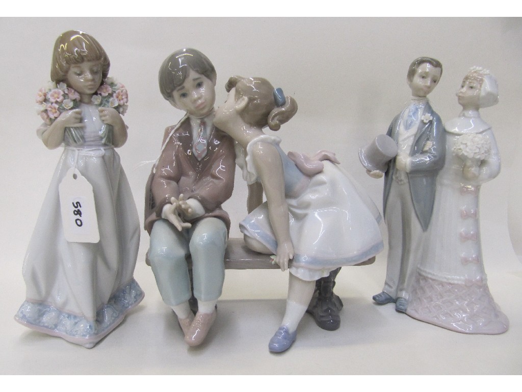 Appraisal: Lladro group of a bride and groom another of a