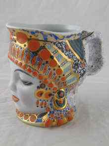 Appraisal: A Russian ceramic tankard formed and decorated as the head