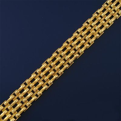 Appraisal: An ct gold stylised gate link bracelet with spare link